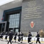 Moroccan security forces display a large haul of seized psychotropic tablets, symbolizing the nation's ongoing fight against illicit drug trafficking.