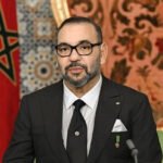 King Mohammed VI of Morocco grants royal pardons to individuals on a significant national anniversary.