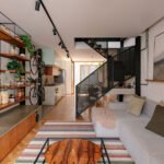 Exterior view of Casa MA, a modern, narrow urban home in São Paulo with a striking facade.