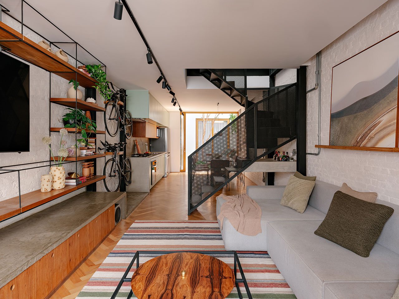 Exterior view of Casa MA, a modern, narrow urban home in São Paulo with a striking facade.