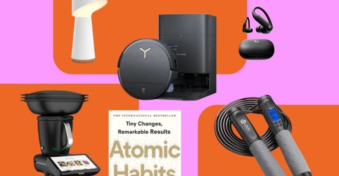 A collection of modern gadgets and tech devices arranged to symbolize New Year's resolutions and goal achievement.