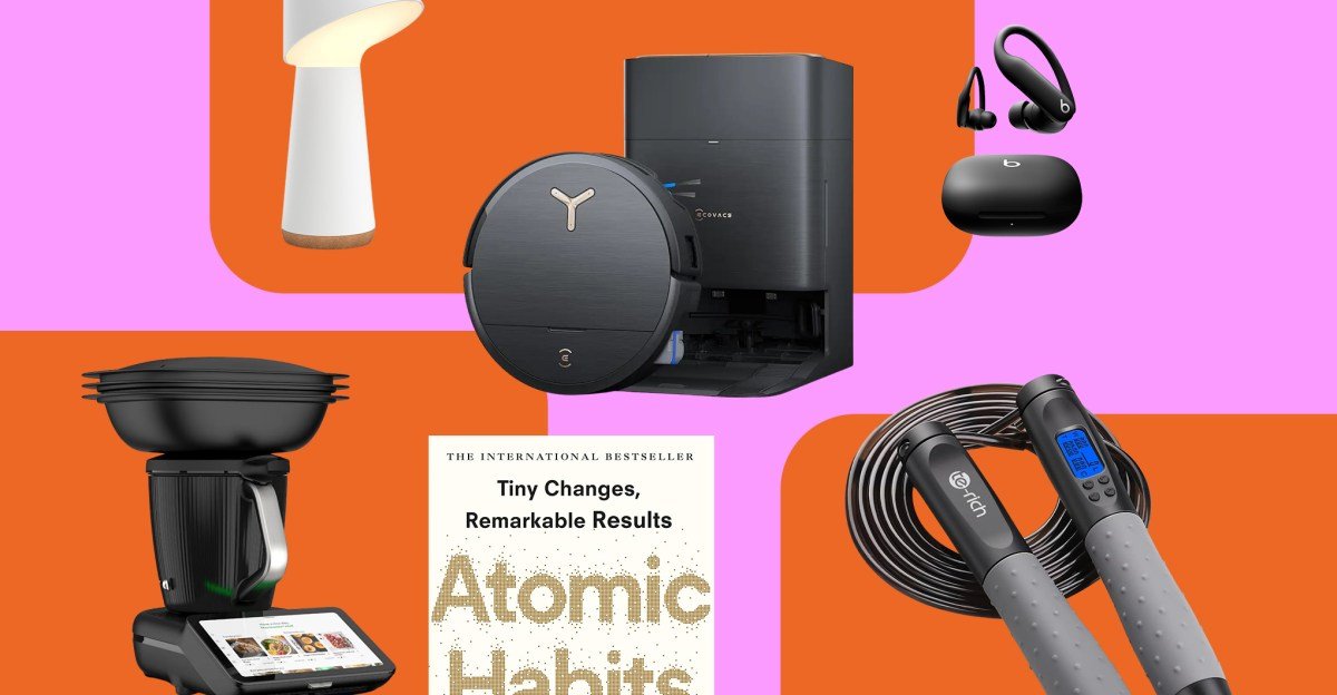 Making Resolutions Stick: The Tech-Driven Guide to a Successful New Year 3 A collection of modern gadgets and tech devices arranged to symbolize New Year's resolutions and goal achievement.