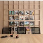 Modern office interior in Warsaw featuring Scandinavian design, natural wood, and integrated acoustic panels, designed by BIT CREATIVE for GN Group.