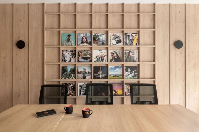 Modern office interior in Warsaw featuring Scandinavian design, natural wood, and integrated acoustic panels, designed by BIT CREATIVE for GN Group.