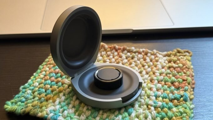 Oura Ring 4 charging case alongside Luna Ring and RingConn cases