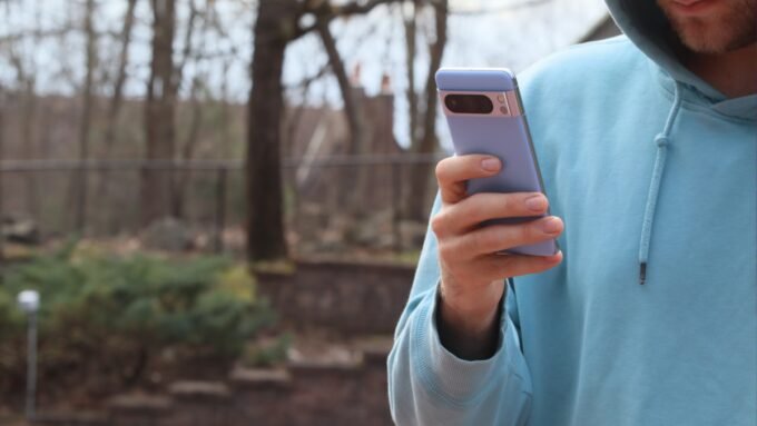 A Google Pixel phone screen displaying the "Take a Message" feature with a privacy warning icon.