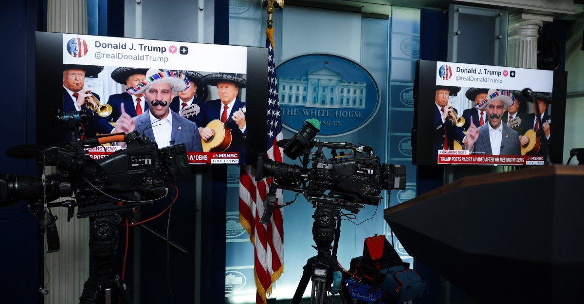 Screens at the White House displaying AI-modified videos of Hakeem Jeffries and Chuck Schumer, shared by President Donald Trump on social media.