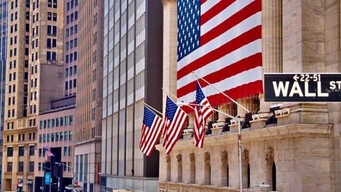 Wall Street, Manhattan, New York skyline at dusk, symbolizing global finance.