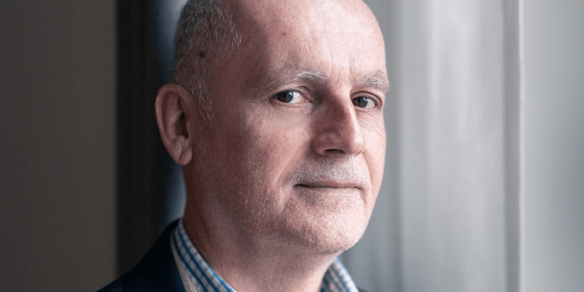 Engineers meticulously testing a secure microchip in a high-tech laboratory, symbolizing the proactive destruction necessary for quantum cybersecurity.