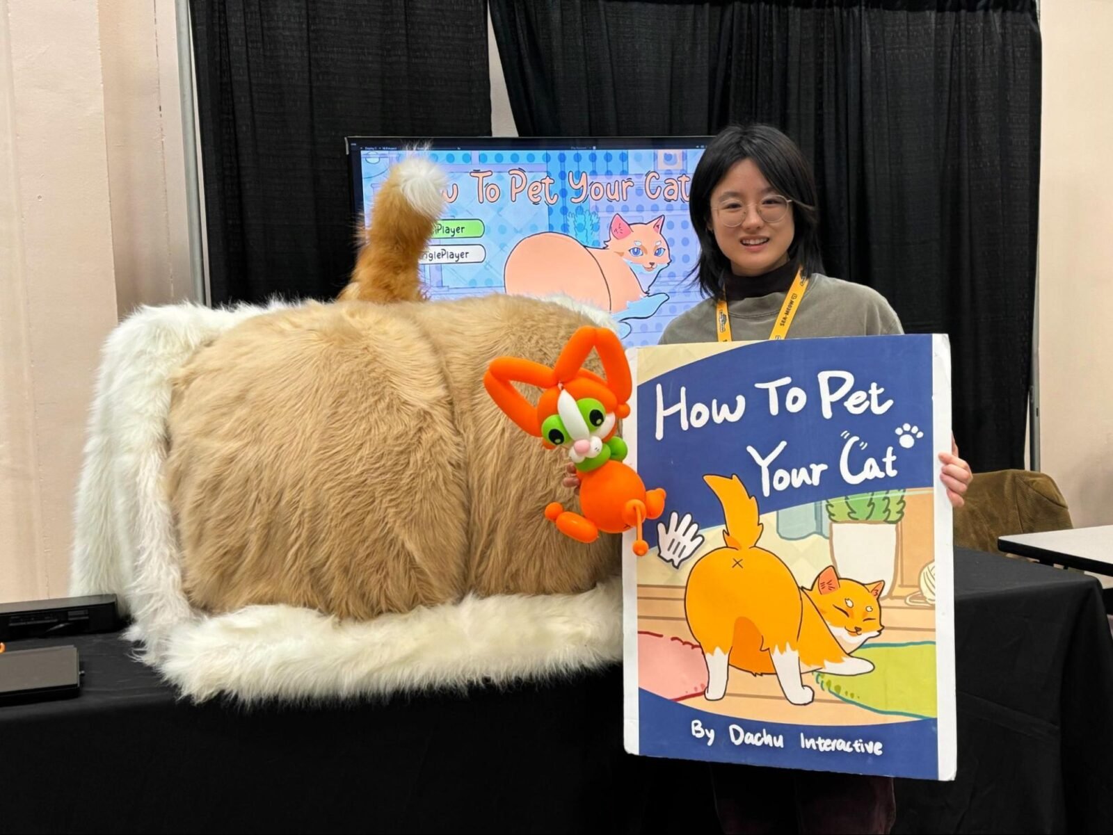 Quinn Liu presenting her viral game 'How to Pet Your Cat' at GDC 2025.