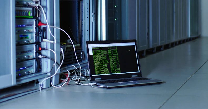 A stylized image depicting a broken network or server rack, symbolizing the disruption of a cybercrime infrastructure, with a faint Microsoft logo in the background.