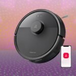 Roborock Q7 L5 robot vacuum and mop cleaning a floor in a modern home.