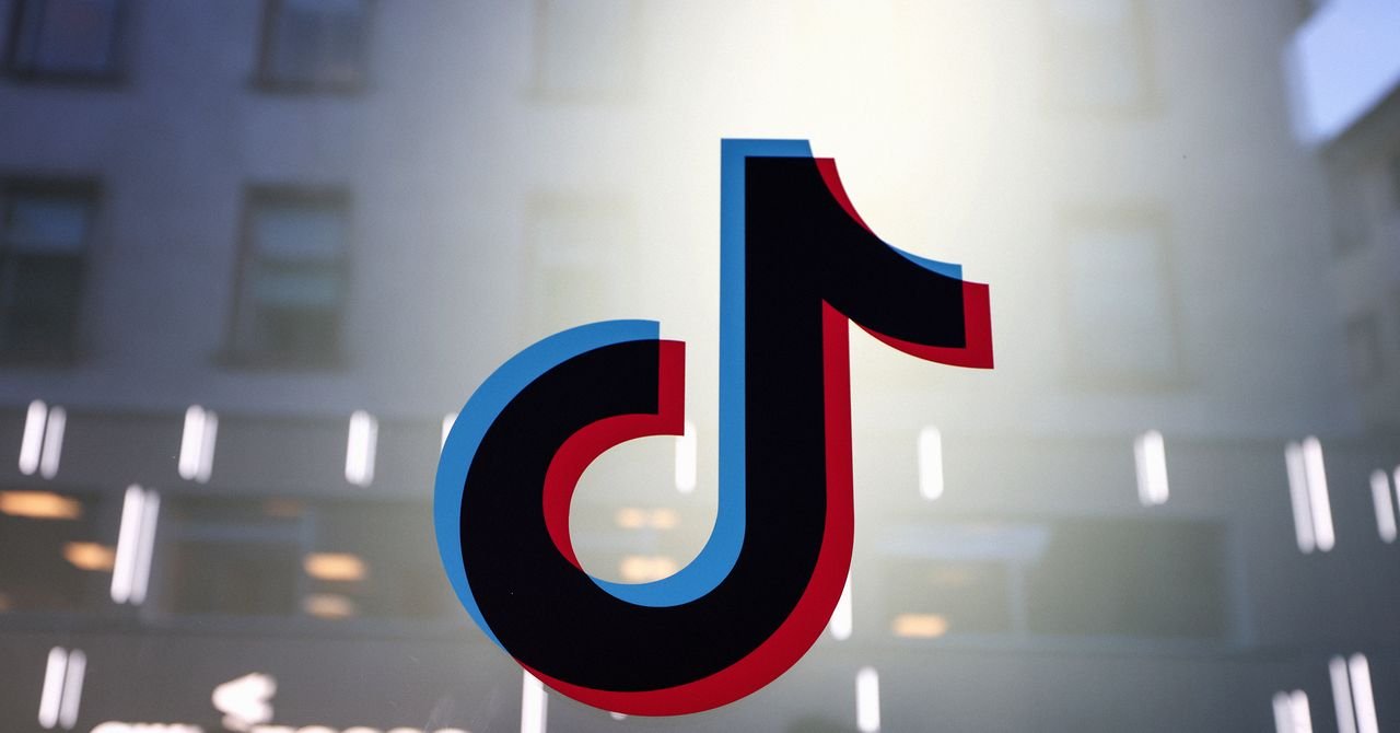The Digital Divide: Is TikTok's Age Verification a Privacy Compromise or a Path to Safety? 3 A smartphone displaying the TikTok logo, with a blurred background of children or young people, symbolizing the debate around age verification on social media platforms.