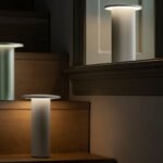 Solae Portable Lamp by Cecilie Manz for Fritz Hansen illuminating an outdoor dining setting