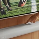 A collection of Sonos audio devices including the Era 100, Era 300 speakers, and Beam and Arc soundbars, showcasing sleek home audio setups.