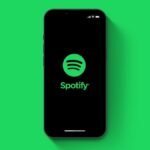 Spotify logo with rising arrow indicating price increases