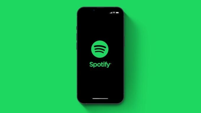 Spotify logo with rising arrow indicating price increases