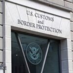 A U.S. Customs and Border Protection sign displayed outside their headquarters in Washington, DC.