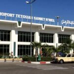 Vue aérienne de l'aéroport Tétouan-Sania R'mel sous un ciel nuageux et pluvieux
