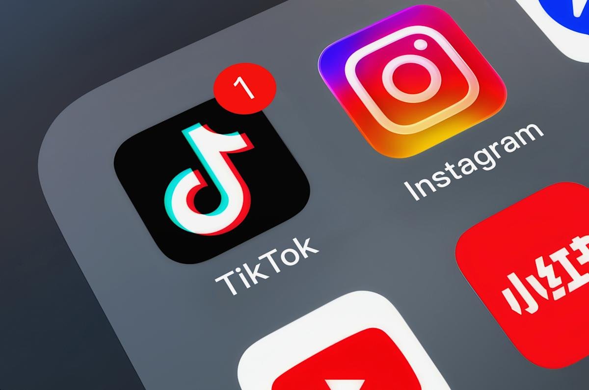 Various social apps on mobile phones including TikTok, Instagram, Facebook, YouTube, and WeChat