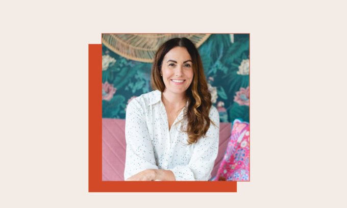 A person demonstrating tongue scraping with a copper scraper, highlighting oral hygiene and its health benefits.