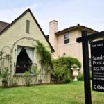 Donald Trump speaking at a podium, discussing his proposed ban on corporate homeownership.