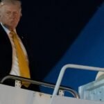 Former President Donald Trump speaking to reporters, possibly discussing international affairs.