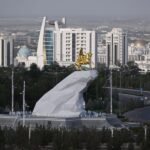 Passengers waiting in an airport terminal in Ashgabat, Turkmenistan, after their flight was diverted.