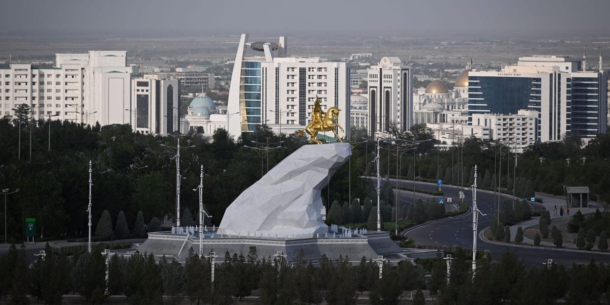 Passengers waiting in an airport terminal in Ashgabat, Turkmenistan, after their flight was diverted.