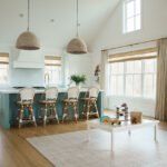 Revolutionizing Home Decor: How TWOPAGES Simplified Custom Window Treatments 6 Ray Chen, founder of TWOPAGES, standing in a room with elegant custom window treatments