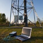 Abstract representation of cyber espionage with network nodes and malware symbols