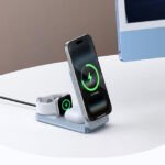UGREEN MagFlow Qi2 3-in-1 Foldable Wireless Charger Station powering an iPhone, Apple Watch, and AirPods.
