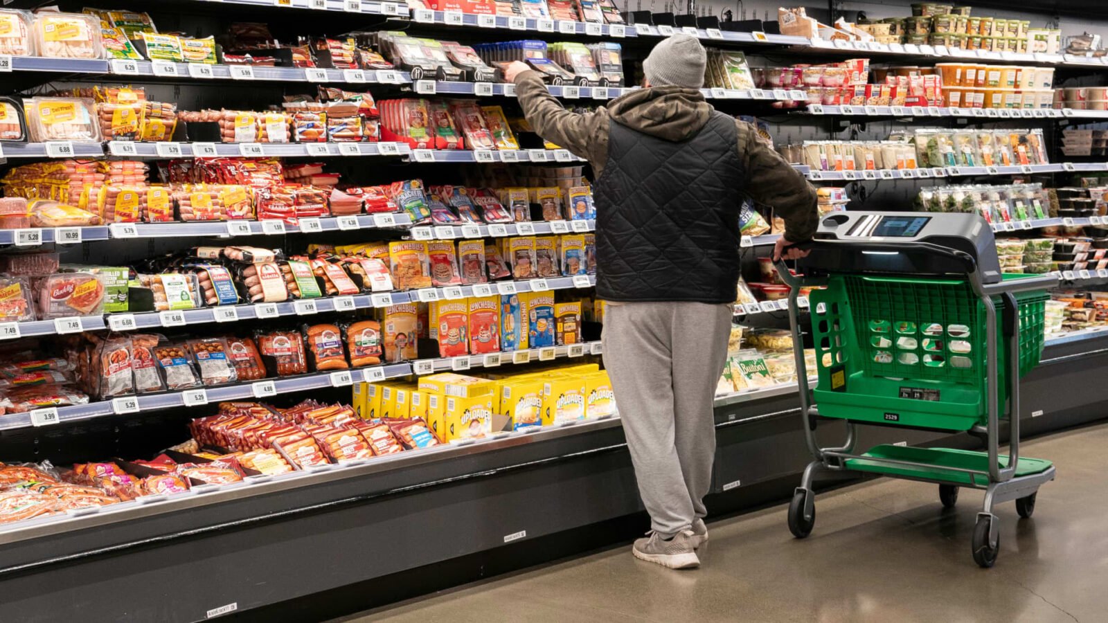 Shoppers at a Costco store in New York City, illustrating robust consumer activity amidst inflation concerns.