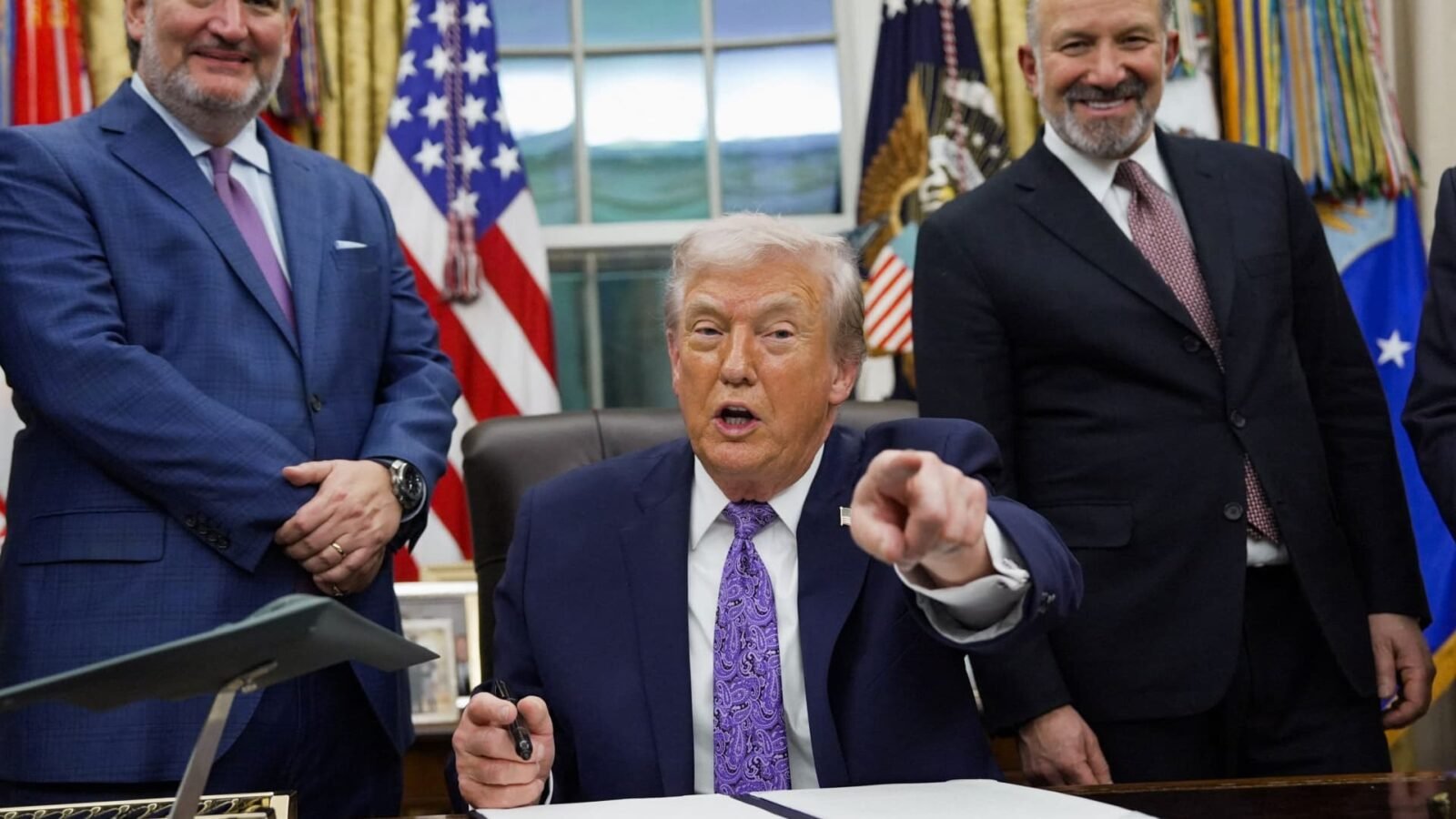 Illustration of microchips or a semiconductor wafer with American and Taiwanese flags in the background, symbolizing the new trade agreement.