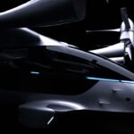 The sleek Valo eVTOL aircraft hovering above a city skyline, ready for urban air mobility.