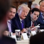 U.S. President Donald Trump (center) during a meeting with oil and gas executives in the East Room of the White House on January 9, 2026.