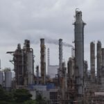 The El Palito refinery of the Venezuelan state oil company PDVSA, symbolizing the nation's oil wealth and potential.