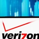 Photo illustration depicting a smartphone displaying an SOS signal, symbolizing a cellular network outage.