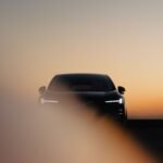 A sleek Volvo EX60 midsize electric SUV, showcasing its modern design and advanced features.