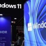 Microsoft Windows 11 logo displayed on a modern computer screen, symbolizing its rapid user growth.