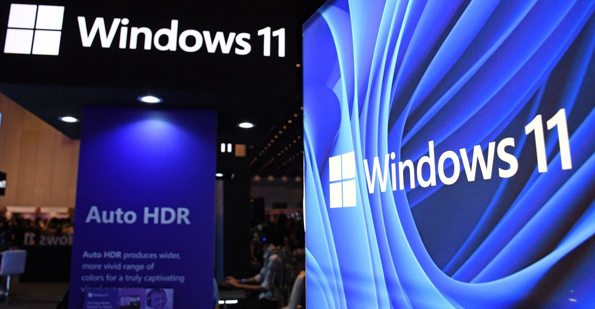 Microsoft Windows 11 logo displayed on a modern computer screen, symbolizing its rapid user growth.