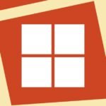 A close-up of a Windows 11 desktop screen with a notification icon, symbolizing a software update issue.