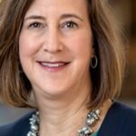 College graduates shaking hands with industry professionals, symbolizing collaboration and readiness for the modern workforce.