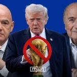 Sepp Blatter, former FIFA president, speaking at a press conference, with a backdrop related to the 2026 World Cup boycott debate.