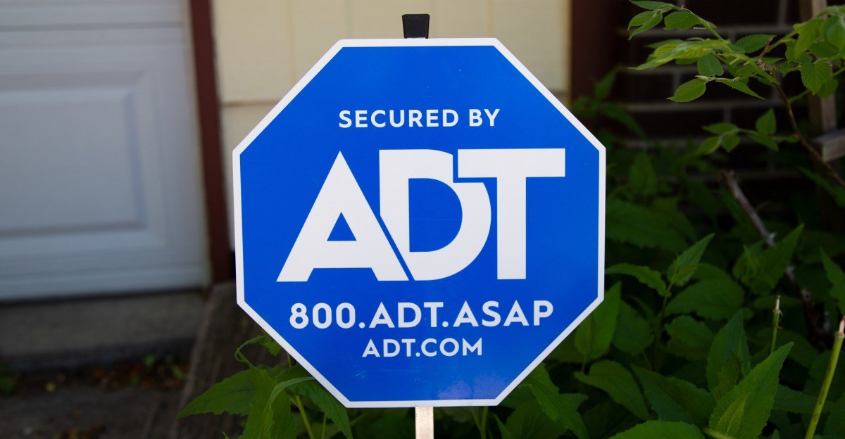 ADT logo alongside a graphic representing Wi-Fi signals detecting motion