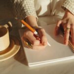 A person meditating peacefully, surrounded by soft, calming light, symbolizing mental clarity and anxiety relief through affirmations.