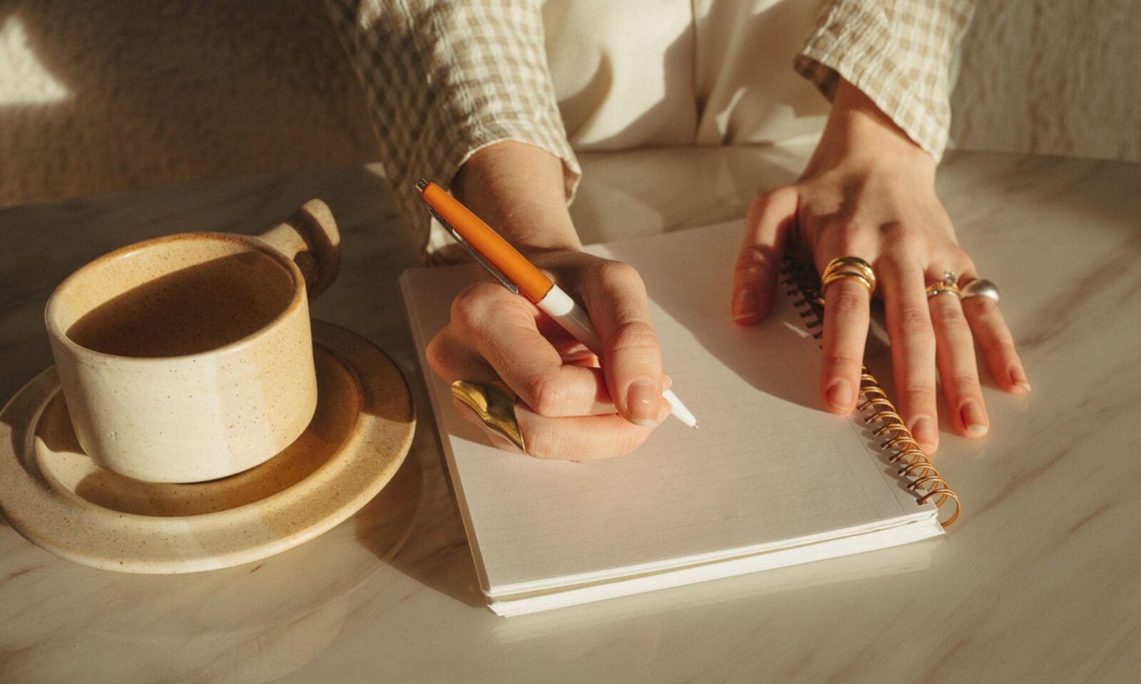 A person meditating peacefully, surrounded by soft, calming light, symbolizing mental clarity and anxiety relief through affirmations.