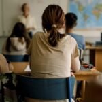 Students from diverse backgrounds using AI tools in a classroom setting, symbolizing both the potential and the current disparity in access.