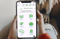 A digital interface displaying stock charts and investment data, with an AI robot icon symbolizing smart investing.