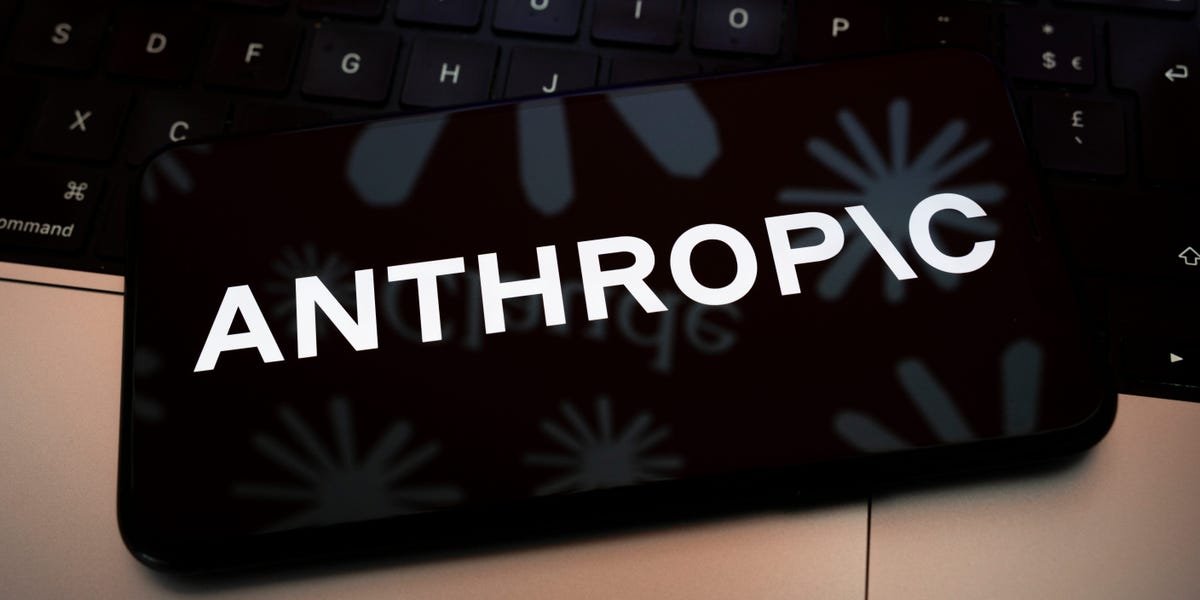 An abstract depiction of AI technology with a warning sign, representing the peril mentioned by an Anthropic safety lead.